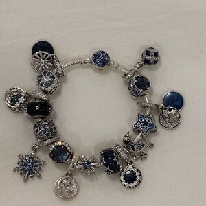 Pandora Silver Bracelet with Blue Charms featuring blue pave cz clasp. 6.7”